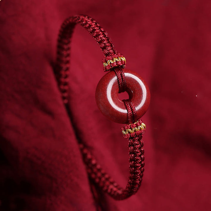 Bracelet tressé fait main en Buddha Stones avec boucle ronde en cinabre et concentration