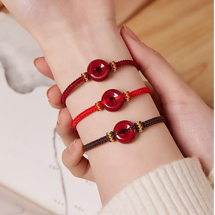 Bracelet tressé fait main en Buddha Stones avec boucle ronde en cinabre et concentration
