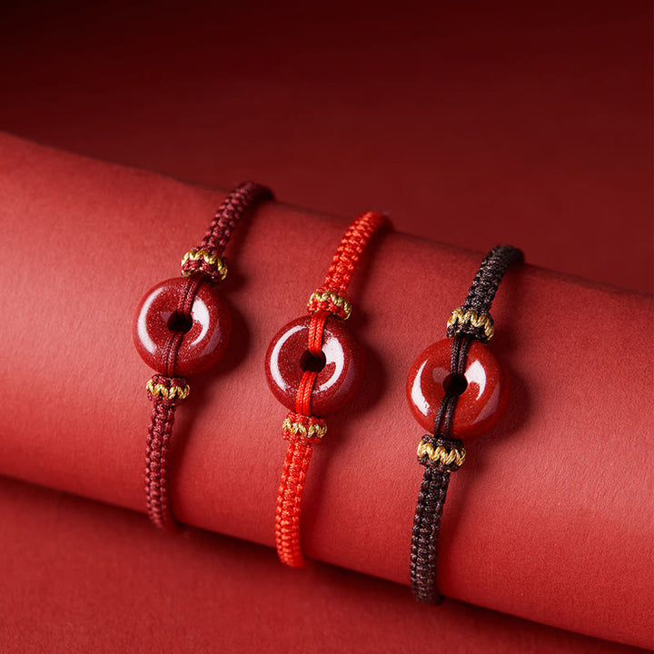 Bracelet tressé fait main en Buddha Stones avec boucle ronde en cinabre et concentration