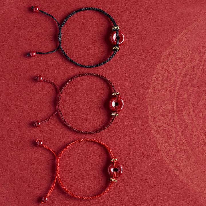 Bracelet tressé fait main en Buddha Stones avec boucle ronde en cinabre et concentration