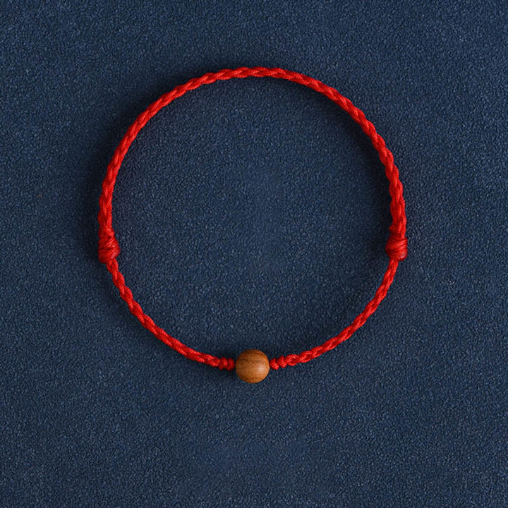 Bracelet tressé en perles de bois de pêche naturel Buddha Stones pour éloigner les mauvais esprits