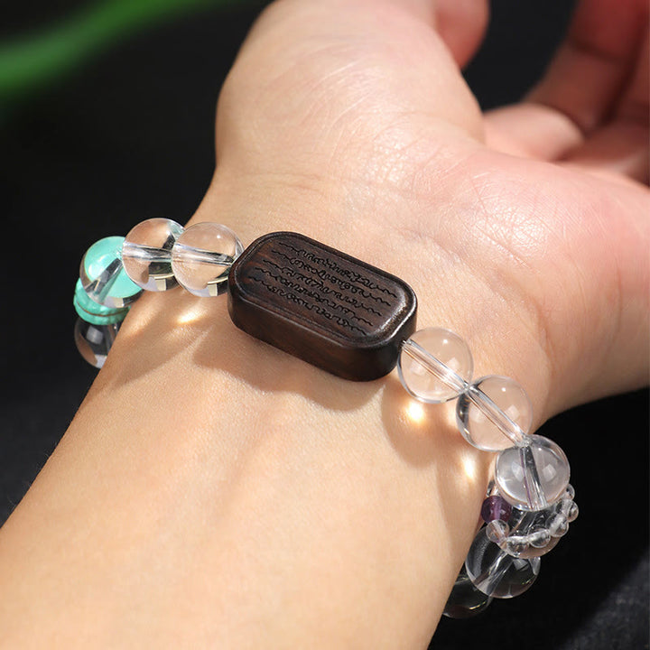 Bracelet de guérison Sak Yant Zashi Lhamo en bois d'ébène et cristal blanc Buddha Stones
