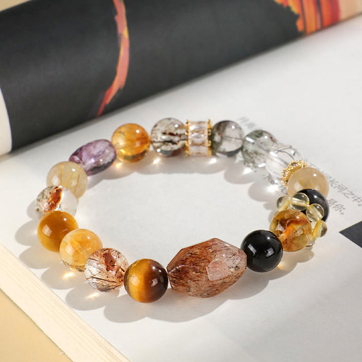 Bracelet de positivité œil de tigre en obsidienne et topaze en cristal Super Seven de Buddha Stones