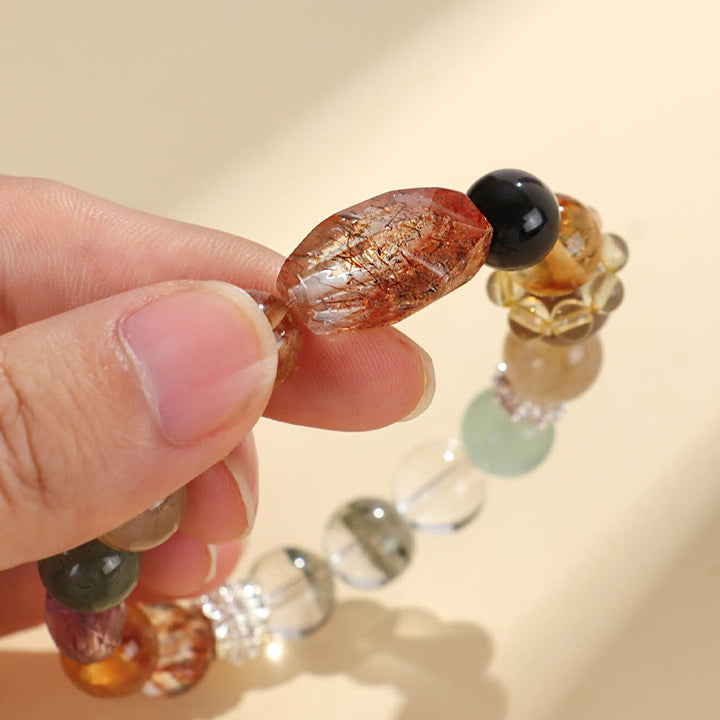 Bracelet de positivité œil de tigre en obsidienne et topaze en cristal Super Seven de Buddha Stones