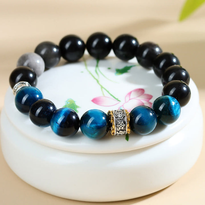 Bracelet de force en obsidienne argentée et œil de tigre bleu Buddha Stones