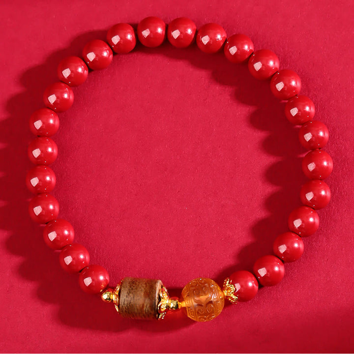 Bracelet de bénédiction en bois d'agar, ambre et cinabre de Buddha Stones
