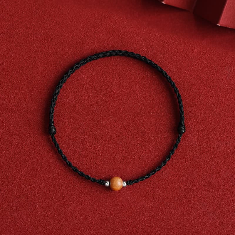 Bracelet de cheville tressé en perles de bois de pêcher naturelles de Buddha Stones