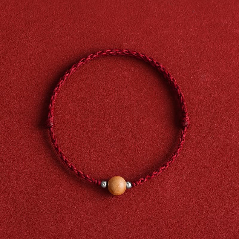 Bracelet de cheville tressé en perles de bois de pêcher naturelles de Buddha Stones