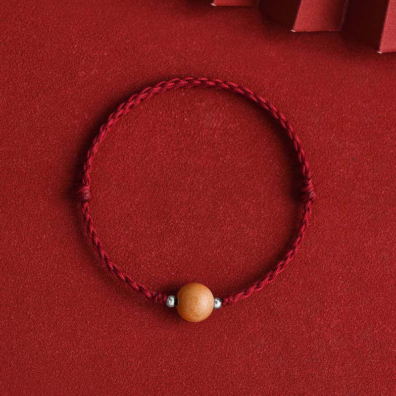 Bracelet de cheville tressé en perles de bois de pêcher naturelles de Buddha Stones