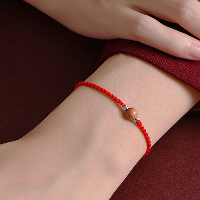 Bracelet de cheville tressé en perles de bois de pêcher naturelles de Buddha Stones