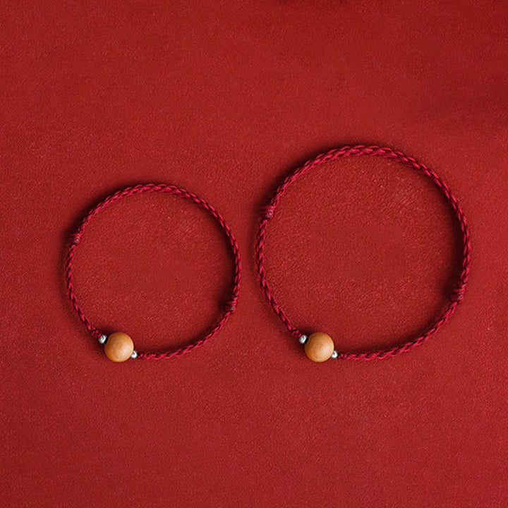 Bracelet de cheville tressé en perles de bois de pêcher naturelles de Buddha Stones