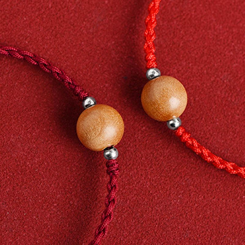 Bracelet de cheville tressé en perles de bois de pêcher naturelles de Buddha Stones