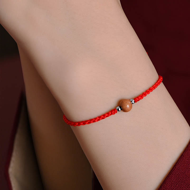 Bracelet de cheville tressé en perles de bois de pêcher naturelles de Buddha Stones