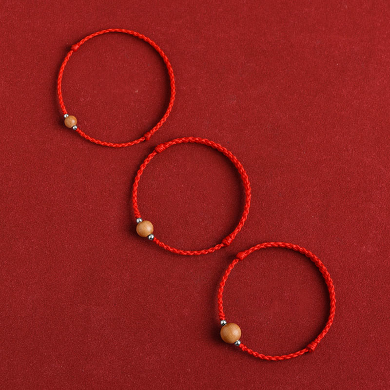 Bracelet de cheville tressé en perles de bois de pêcher naturelles de Buddha Stones
