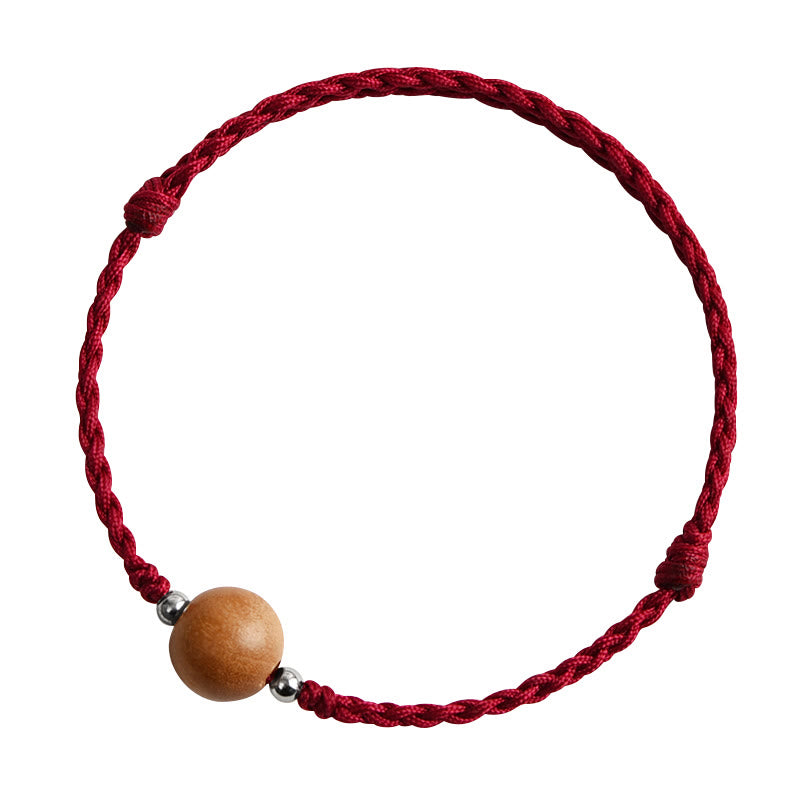 Bracelet de cheville tressé en perles de bois de pêcher naturelles de Buddha Stones