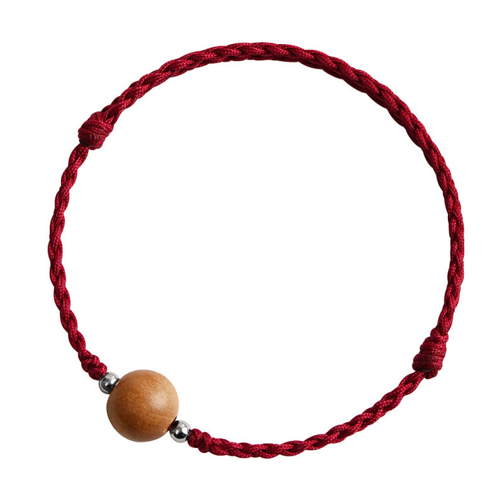 Bracelet de cheville tressé en perles de bois de pêcher naturelles de Buddha Stones