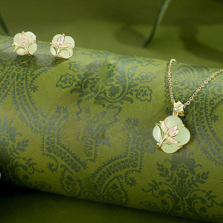 Buddha Stones en jade Hetian avec papillon et magnolia