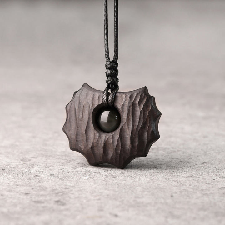 Collier pendentif en obsidienne en bois d'ébène et Buddha Stones de forme irrégulière pour la paix et le calme