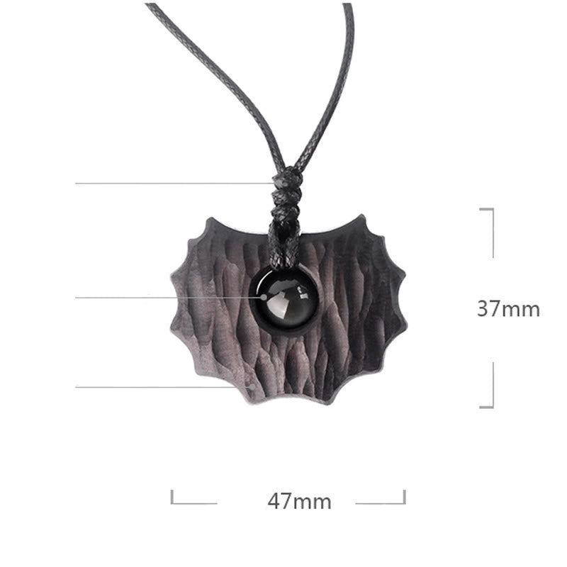 Collier pendentif en obsidienne en bois d'ébène et Buddha Stones de forme irrégulière pour la paix et le calme