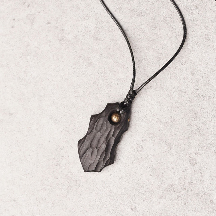 Collier pendentif en perles de cuivre de forme irrégulière en bois d'ébène et Buddha Stones