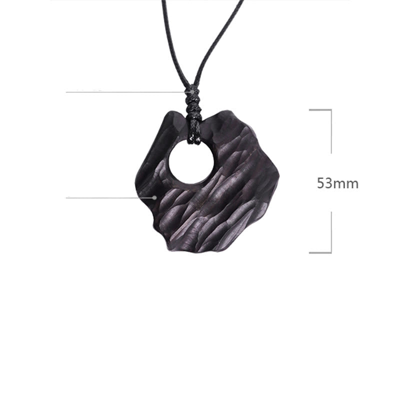 Collier pendentif en bois d'ébène avec Buddha Stones, forme creuse irrégulière, équilibre de la paix