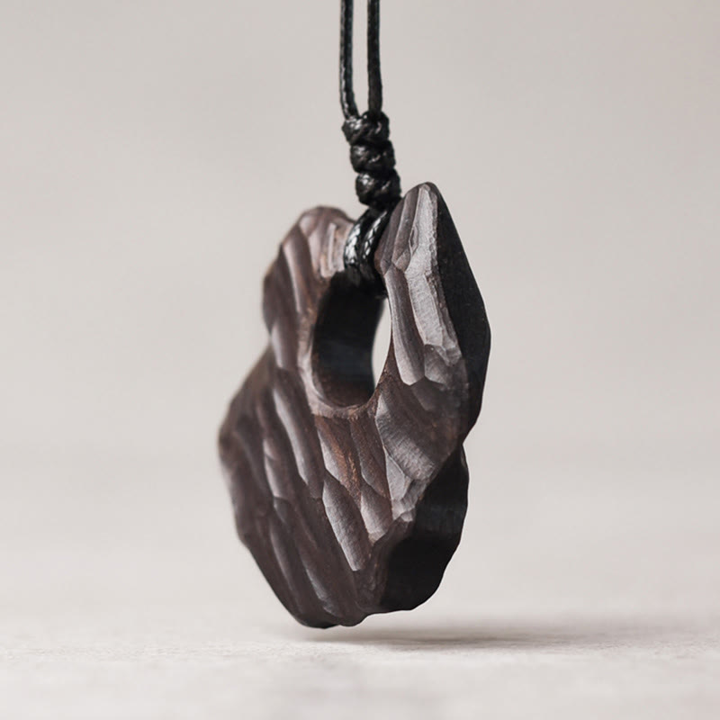 Collier pendentif en bois d'ébène avec Buddha Stones, forme creuse irrégulière, équilibre de la paix