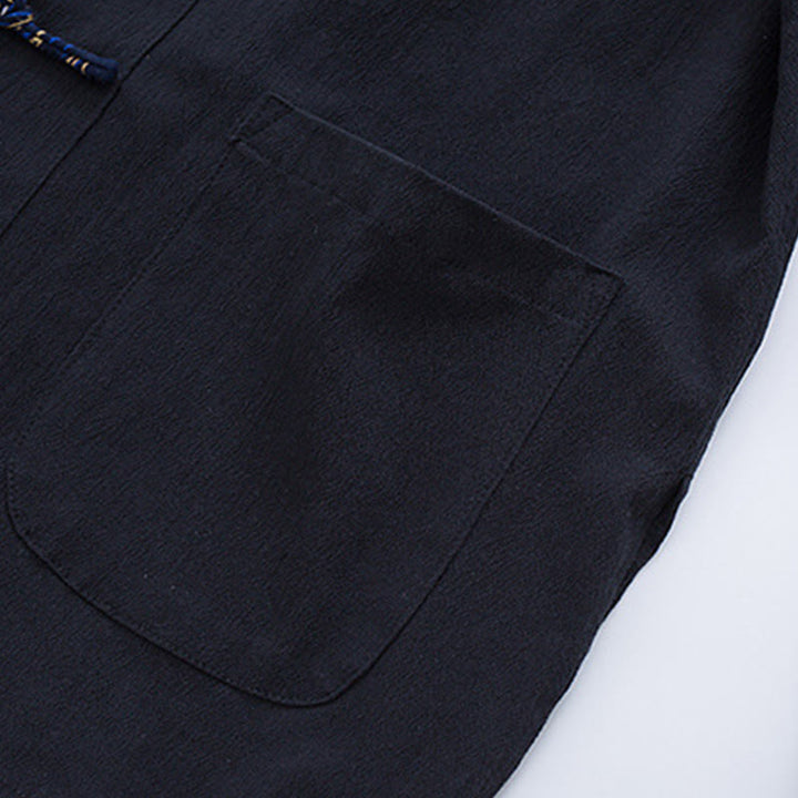 Veste-chemise en coton à boutons de grenouille pour hommes Buddha Stones avec broderie de grue blanche et poches