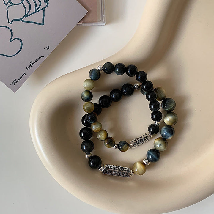 Bracelet en obsidienne noire naturelle et œil de tigre avec six mots vrais « om Mani Padme Hum » et force et amour