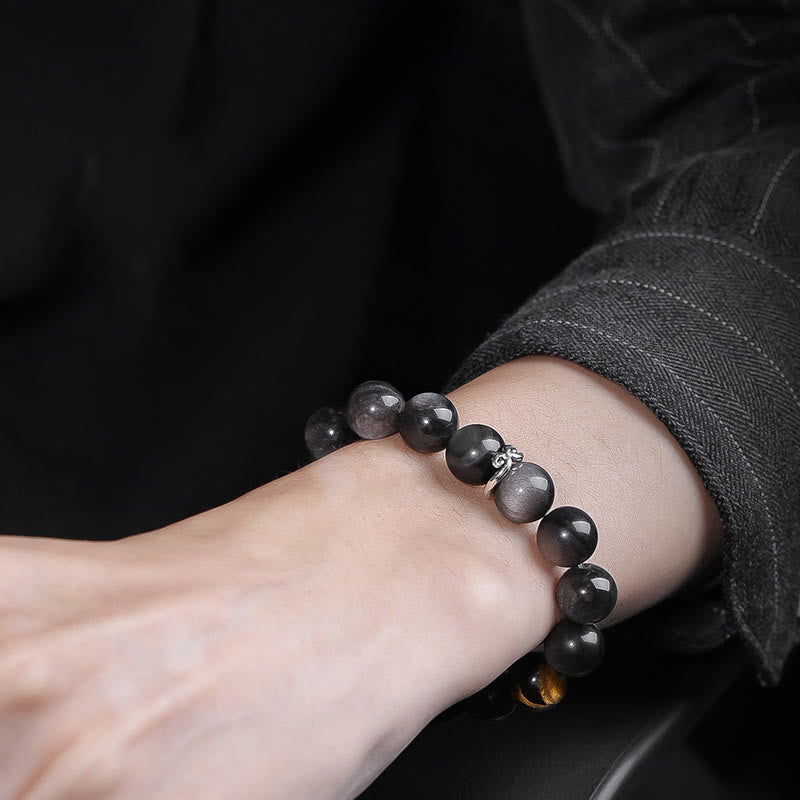 Bracelet de force en Buddha Stones naturelle argentée et brillante avec six mots vrais « om Mani Padme Hum » et œil de tigre