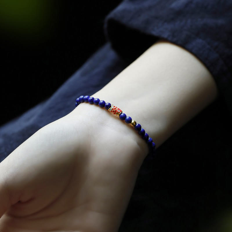 Bracelet positif en Buddha Stones et lazurite avec poisson koï