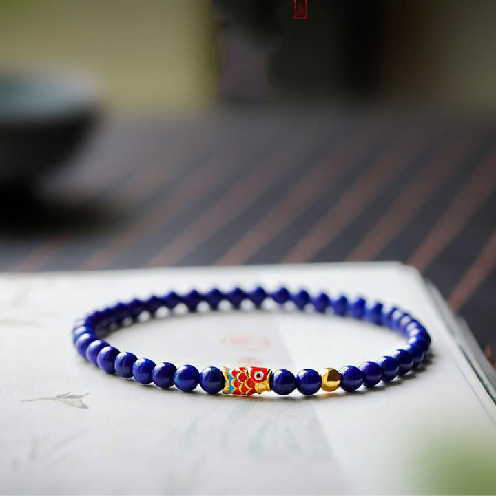 Bracelet positif en Buddha Stones et lazurite avec poisson koï