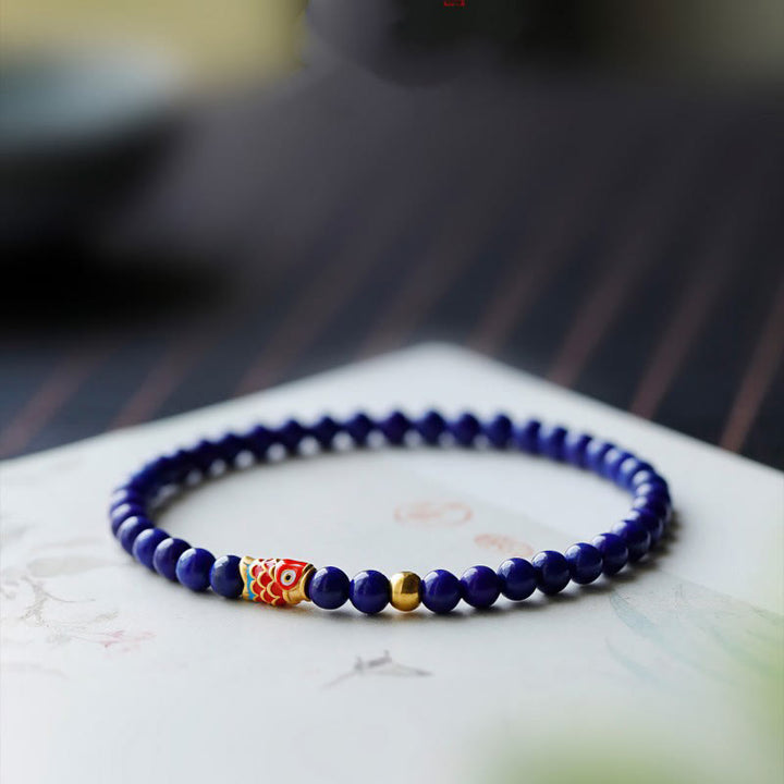 Bracelet positif en Buddha Stones et lazurite avec poisson koï