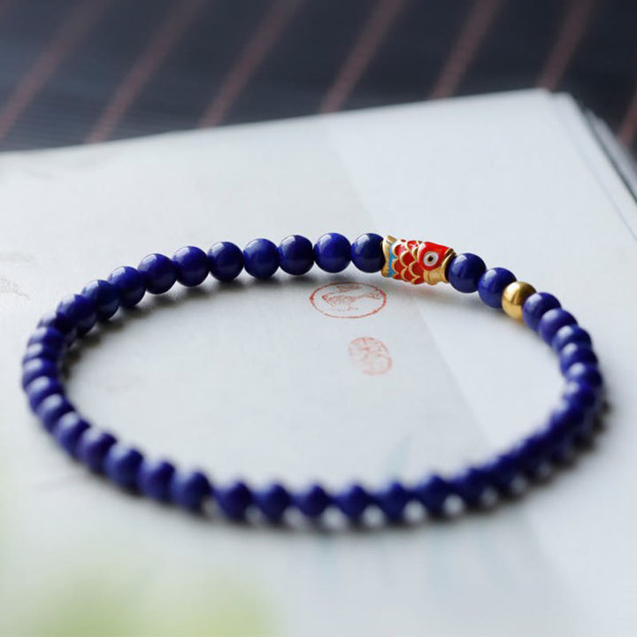 Bracelet positif en Buddha Stones et lazurite avec poisson koï