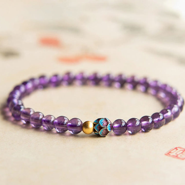 Bracelet de conscience spirituelle en améthyste naturelle et lotus de Buddha Stones