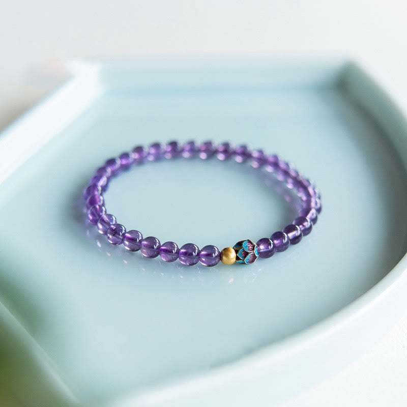 Bracelet de conscience spirituelle en améthyste naturelle et lotus de Buddha Stones
