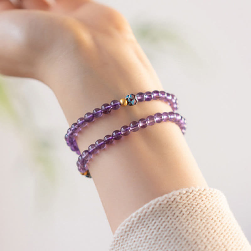Bracelet de conscience spirituelle en améthyste naturelle et lotus de Buddha Stones
