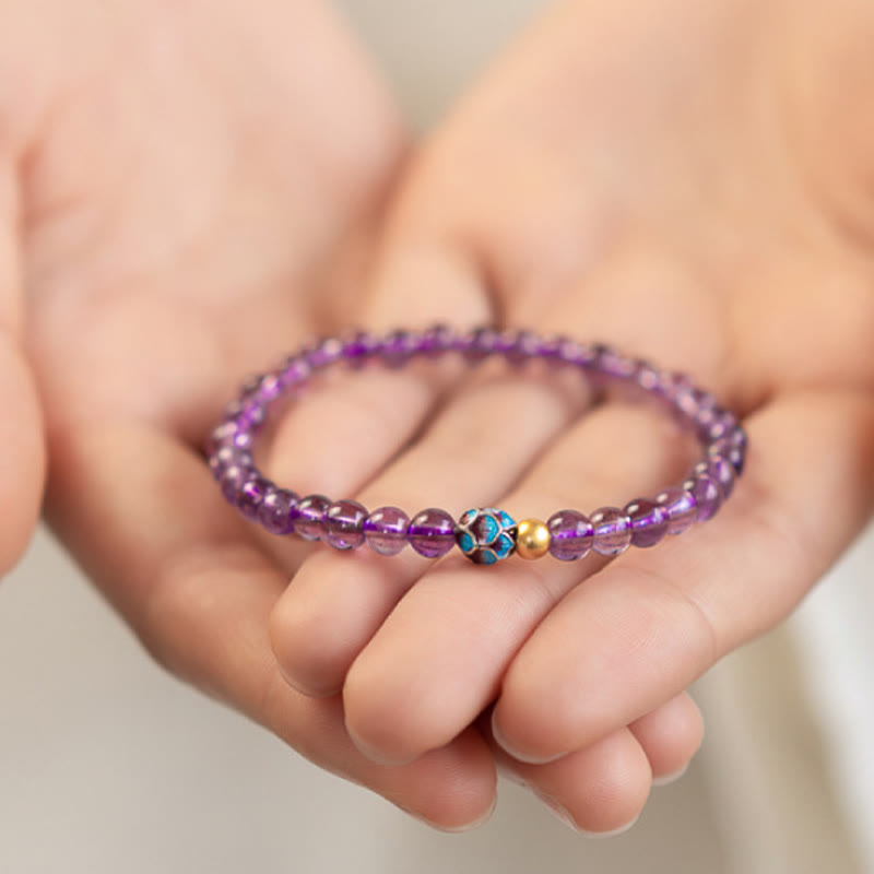 Bracelet de conscience spirituelle en améthyste naturelle et lotus de Buddha Stones