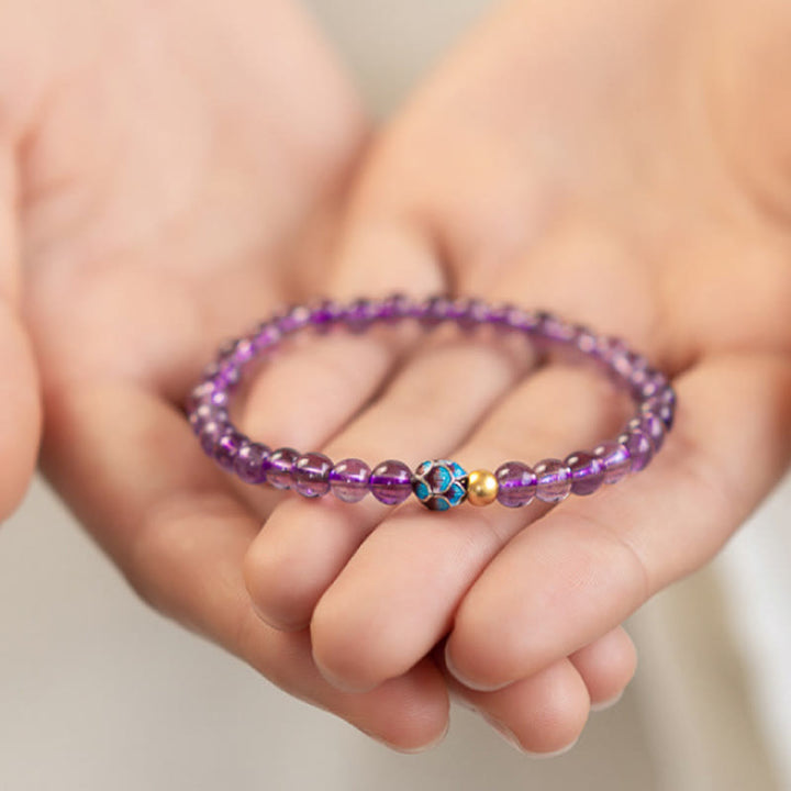 Bracelet de conscience spirituelle en améthyste naturelle et lotus de Buddha Stones