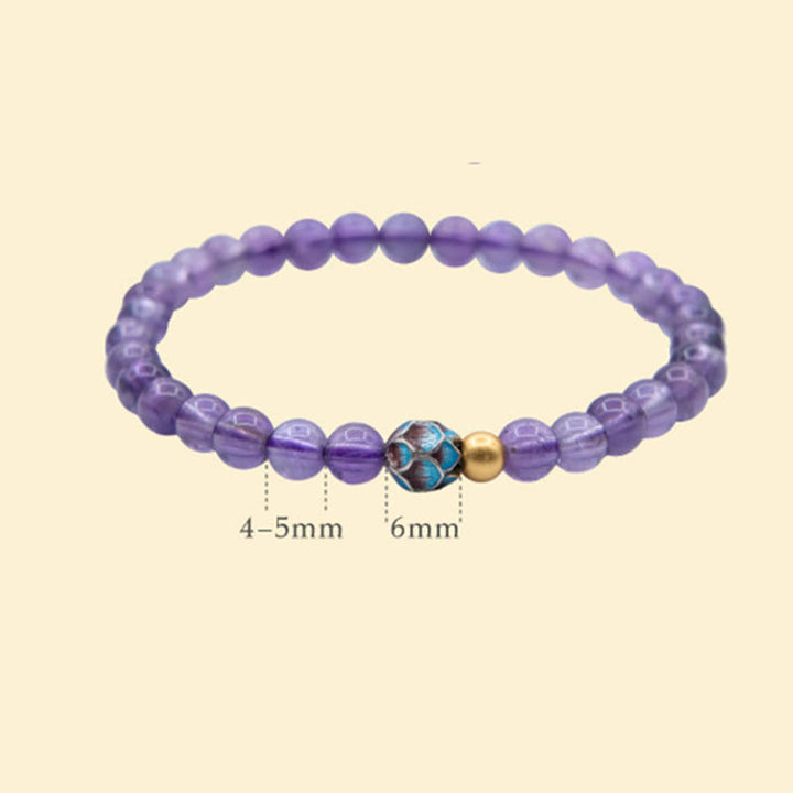 Bracelet de conscience spirituelle en améthyste naturelle et lotus de Buddha Stones