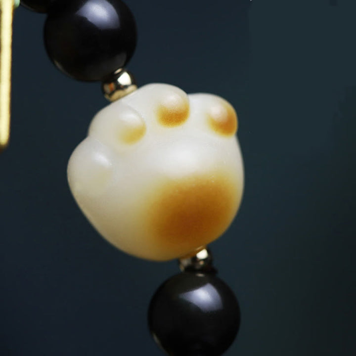 Bracelet de purification porte-bonheur en obsidienne Buddha Stones avec patte de chat et graine de Bodhi - image 14