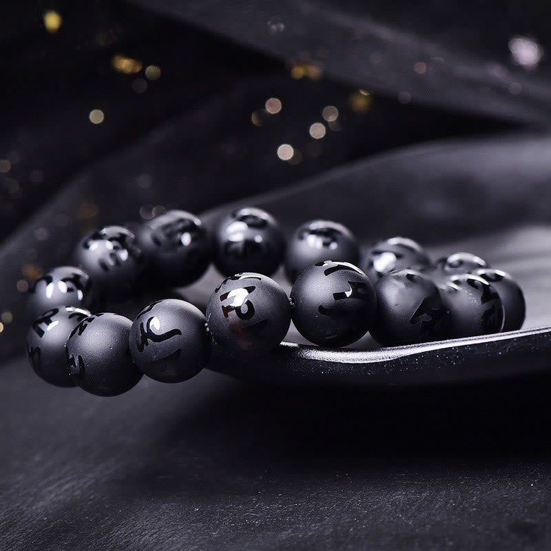 Bracelet de protection sculpté en onyx noir naturel Buddha Stones Om Mani Padme Hum