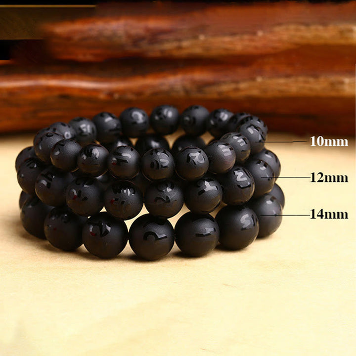 Bracelet de protection sculpté en onyx noir naturel Buddha Stones Om Mani Padme Hum