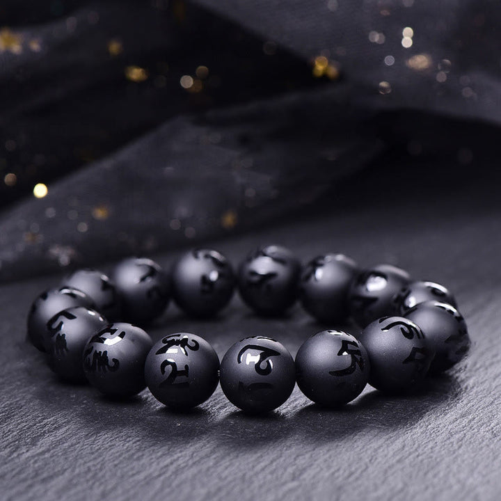 Bracelet de protection sculpté en onyx noir naturel Buddha Stones Om Mani Padme Hum