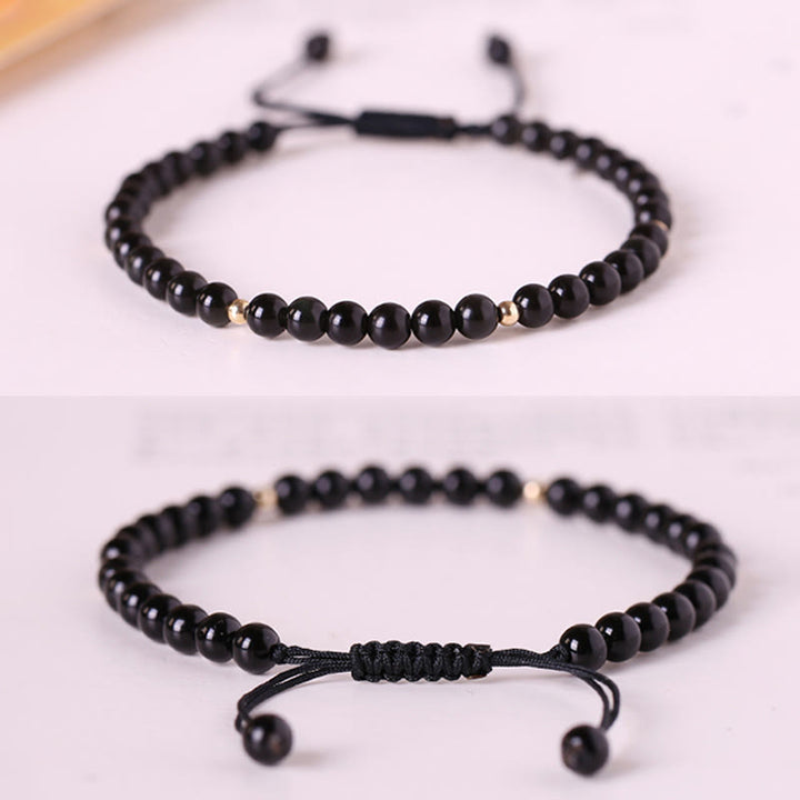 Bracelet en corde avec petites perles d'obsidienne noire Buddha Stones
