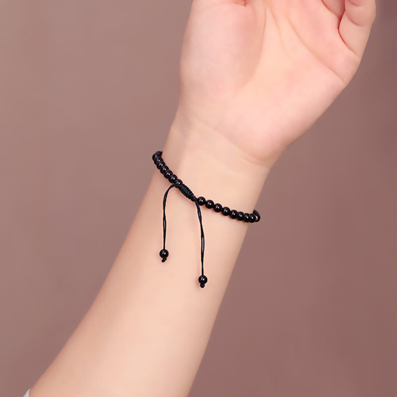 Bracelet en corde avec petites perles d'obsidienne noire Buddha Stones