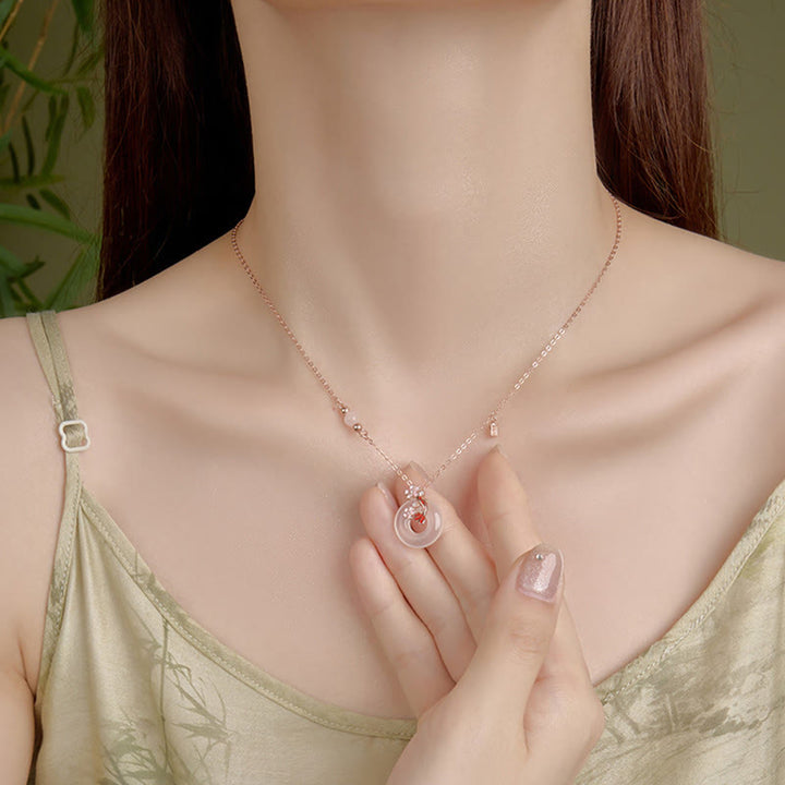 Collier pendentif positif en argent sterling 925 avec boucle de paix et poisson Koi et Buddha Stones en calcédoine et cristal rose