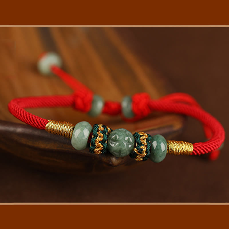 Bracelet en corde rouge avec perles de boulier en jade et Buddha Stones