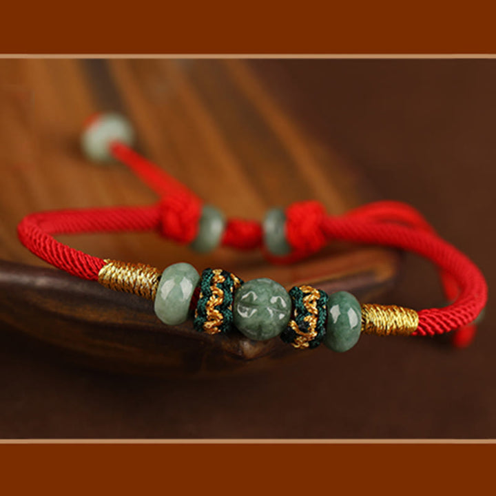 Bracelet en corde rouge avec perles de boulier en jade et Buddha Stones