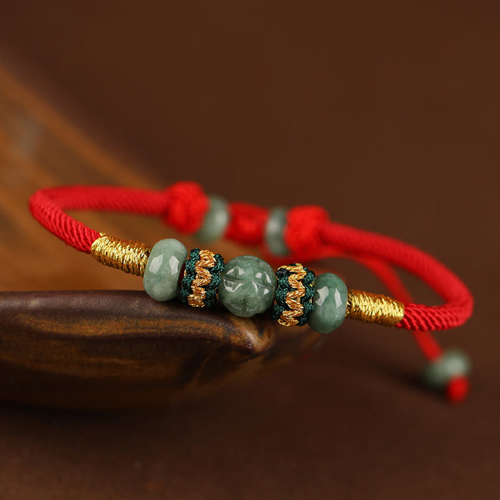 Bracelet en corde rouge avec perles de boulier en jade et Buddha Stones