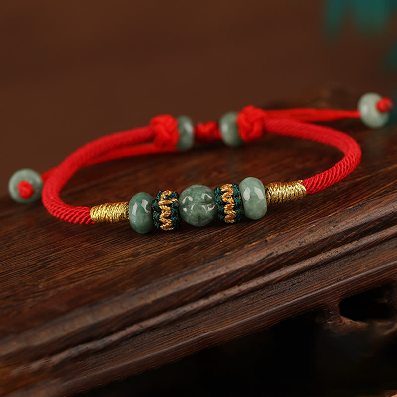 Bracelet en corde rouge avec perles de boulier en jade et Buddha Stones